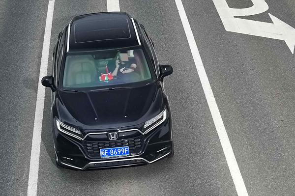 2025年5月26日闽E8699F驾驶时拨打接听手持电话的.jpg
