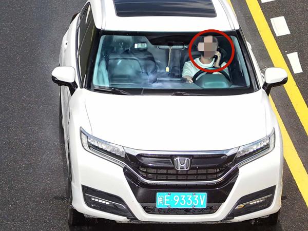 2025年6月21日闽E9333V驾驶时拨打接听手持电话的.jpg