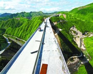 宁武高速路2号特大桥全部合龙 桥面距谷底140米
